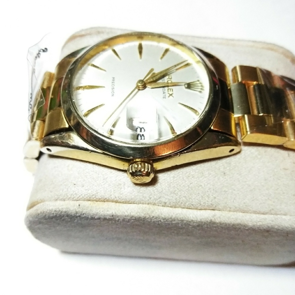 Rolex precision 6694 14k gold shell hand wind